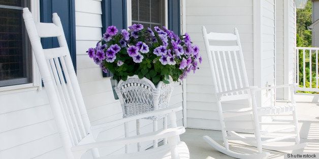 white rocking chairs with...