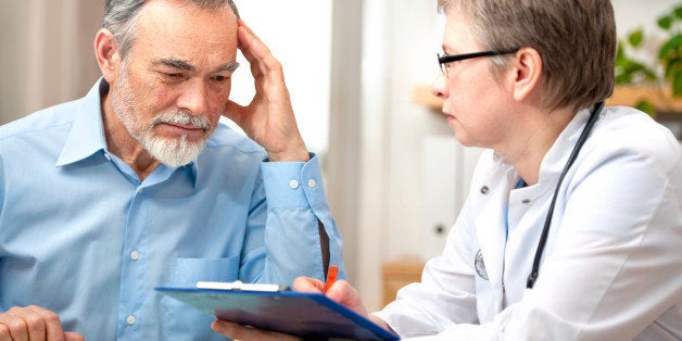 Male patient tells the doctor about his health complaintsPlease see similar images here: