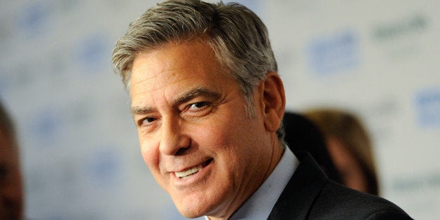 George Clooney attends "An Evening of SeriousFun Celebrating the Legacy of Paul Newman", hosted by the SeriousFun Children's Network at Avery Fisher Hall on Monday, March 2, 2015, in New York. (Photo by Evan Agostini/Invision/AP)
