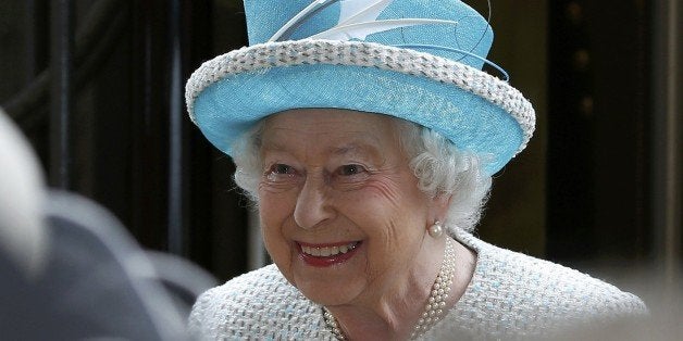 Britain's Queen Elizabeth II smiles as she arrives at Lancaster railway station in Lancaster, northern England on May 29, 201