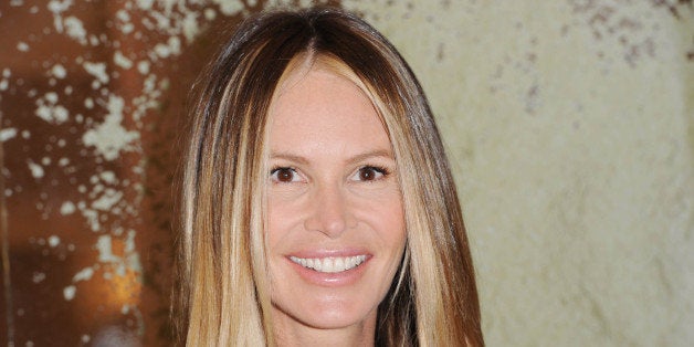 LONDON, UNITED KINGDOM - MAY 22: Elle Macpherson launches The Super Elixir at Selfridges on May 22, 2014 in London, England. (Photo by Stuart C. Wilson/Getty Images)