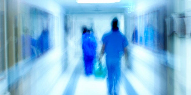 Hospital personnel in a hallway