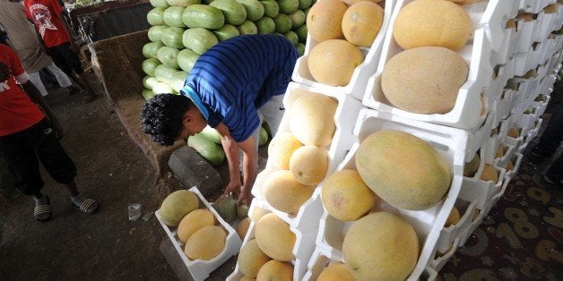 A Saudi man displays melons on a stall at Otaiga public market in the Manfouha district of the capital Riyadh on June 17, 2015 as the faithful prepare for the start of the Muslim holy fasting month of Ramadan. More than 1.5 billion Muslims around the world will mark the month, during which believers abstain from eating, drinking, smoking and having sex from dawn until sunset. AFP PHOTO / FAYEZ NURELDINE (Photo credit should read FAYEZ NURELDINE/AFP/Getty Images)