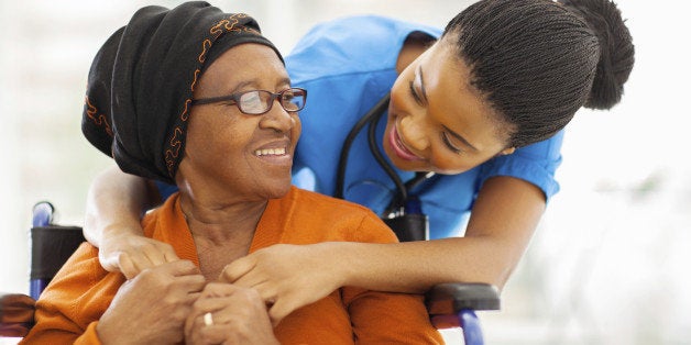 happy senior patient with friendly female nurse