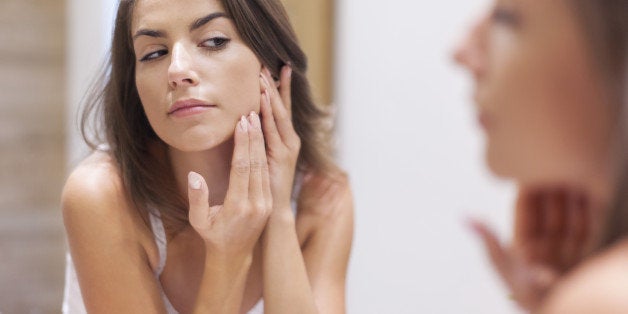 Woman taking care of her skin