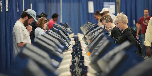 CHICAGO, IL - OCTOBER 18: Residents cast ballots for the November 8 election at an early voting site on October 18, 2016 in Chicago, Illinois. With three weeks to go until election day, polls show Democratic candidate Hillary Clinton with a lead over GOP rival Donald Trump. (Photo by Scott Olson/Getty Images)