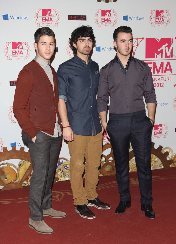 Nick Jonas, Joe Jonas and Kevin Jonas of The Jonas Brothers arriving for the The MTV EMA's 2012 held at Festhalle, Frankfurt, Germany. 11/11/2012 Picture by: Henry Harris
