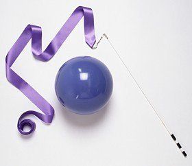 Rhythmic gymnastics equipment, blue ball and purple ribbon.