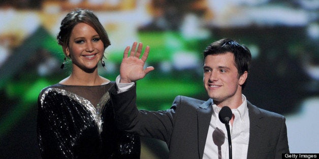 LOS ANGELES, CA - JANUARY 09: Actors Jennifer Lawrence and Josh Hutchinson onstage at the 39th Annual People's Choice Awards at Nokia Theatre L.A. Live on January 9, 2013 in Los Angeles, California. (Photo by Kevin Winter/Getty Images for PCA)