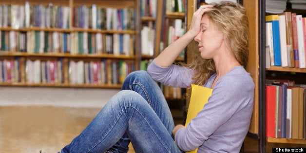 sad student in library