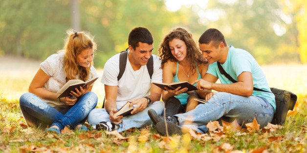 Group of young college students at park