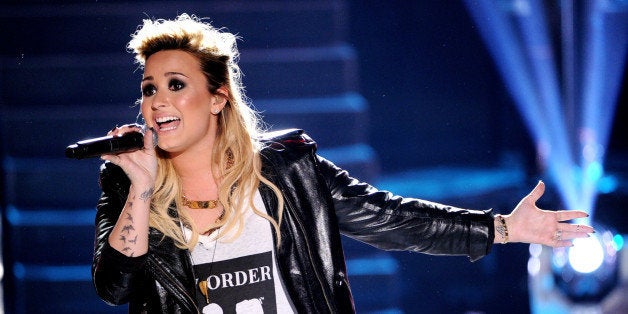 UNIVERSAL CITY, CA - AUGUST 11: Singer Demi Lovato performs onstage at the Teen Choice Awards 2013 at the Gibson Amphitheatr