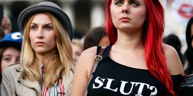 Women take part in a 'slut walk' in London on September 22, 2012 to protest against the police and courts' denial of justice