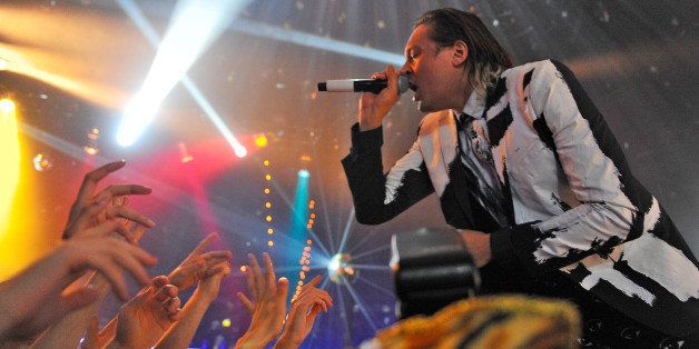 LONDON, ENGLAND - NOVEMBER 11: Win Butler of Arcade Fire, playing under the pseudonym The Reflektors, performs at The Roundhouse on November 11, 2013 in London, England. (Photo by Matt Kent/WireImage)