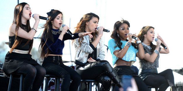 SUNRISE, FL - DECEMBER 20: (L-R) Lauren Jauregui, Camila Cabello, Dinah Jane Hansen, Normani Kordei, Ally Brooke of Fifth Harmony perform at Y100s Pre-Show at the Jingle Ball Village on the plaza at the BB&T Center on December 20, 2013 in Miami, Florida. (Photo by Larry Marano/Getty Images for Clear Channel)