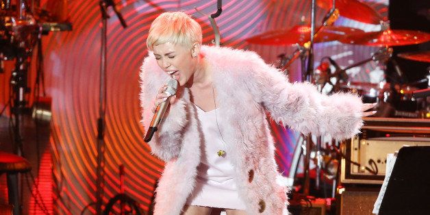 BEVERLY HILLS, CA - JANUARY 25: Miley Cyrus performs onstage during the Clive Davis and The Recording Academy present The Annual Pre-GRAMMY Gala held at The Beverly Hilton Hotel on January 25, 2014 in Beverly Hills, California. (Photo by Michael Tran/FilmMagic)