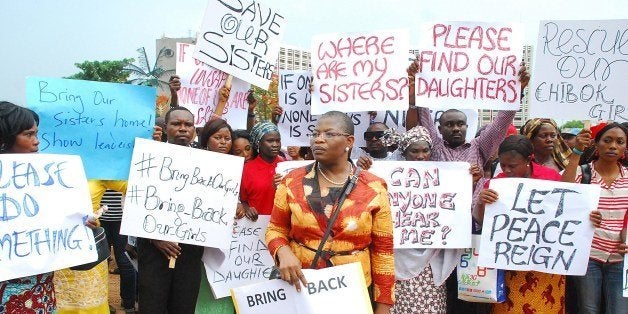 Former Nigerian Education Minister and Vice-President of the World Bank's Africa division (C) Obiageli Ezekwesilieze leads a