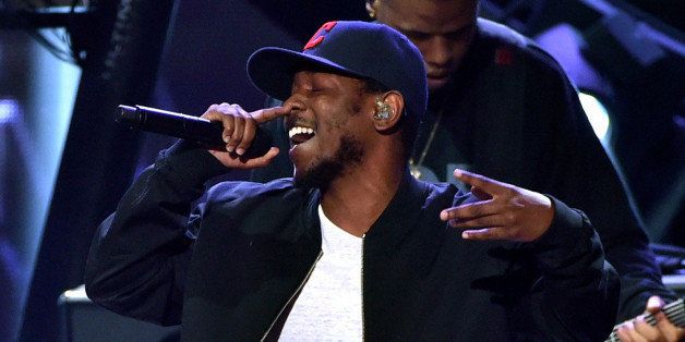 LOS ANGELES, CA - MAY 01: Rapper Kendrick Lamar performs onstage during the 2014 iHeartRadio Music Awards held at The Shrine Auditorium on May 1, 2014 in Los Angeles, California. iHeartRadio Music Awards are being broadcast live on NBC. (Photo by Kevin Winter/Getty Images for Clear Channel)