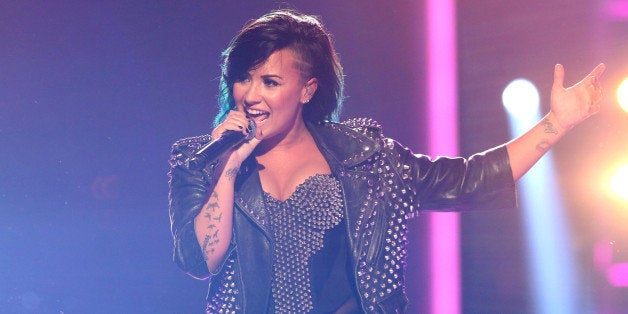 Demi Lovato performs at the Vevo Certified SuperFanFest Live Concert at the Barker Hangar on Wednesday, Oct. 8, 2014, in Sant