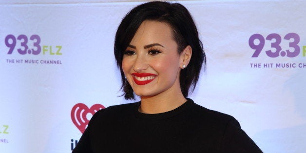 Demi Lovato attends 93.3 FLZ's Jingle Ball 2014 at Amalie Arena on Friday, Dec. 22, 2014, in Tampa, Florida. (Photo by John Davisson/Invision/AP)