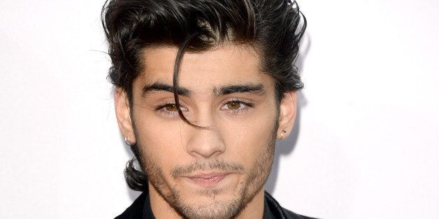 LOS ANGELES, CA - NOVEMBER 23: Singer Zayn Malik of One Direction attends the 2014 American Music Awards at Nokia Theatre L.A. Live on November 23, 2014 in Los Angeles, California. (Photo by Jason Merritt/Getty Images)
