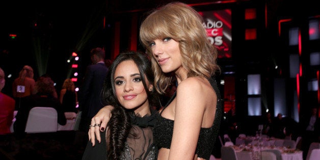 LOS ANGELES, CA - MARCH 29: iHEARTRADIO MUSIC AWARDS -- Pictured: (l-r) Recording artists Camila Cabello of Fifth Harmony and Taylor Swift at the iHeartRadio Music Awards held at the Shrine Auditorium on March 29, 2015 in Los Angeles, California. -- (Photo by: Chris Polk/NBC/NBCU Photo Bank) (Photo by Christopher Polk/NBC/NBC via Getty Images)