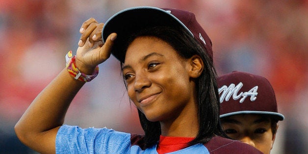 PHILADELPHIA, PA - AUGUST 27: Taney Dragons Pitcher Mo'ne Davis tips her hat as she is introduced and recognized before the game between the Washington Nationals and the Philadelphia Phillies at Citizens Bank Park on August 27, 2014 in Philadelphia, Pennsylvania. (Photo by Brian Garfinkel/Getty Images)