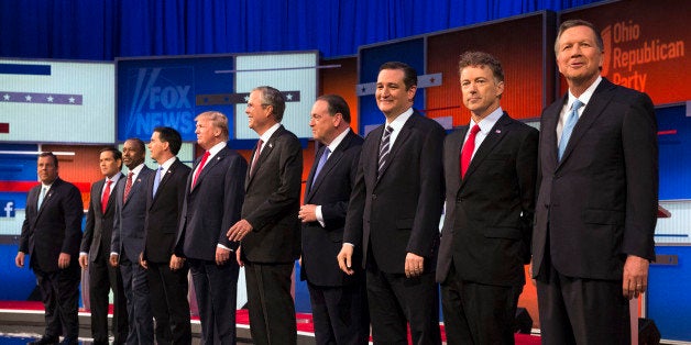 Republican presidential candidates from left, Chris Christie, Marco Rubio, Ben Carson, Scott Walker, Donald Trump, Jeb Bush, Mike Huckabee, Ted Cruz, Rand Paul, and John Kasich take the stage for the first Republican presidential debate at the Quicken Loans Arena Thursday, Aug. 6, 2015, in Cleveland. (AP Photo/John Minchillo)