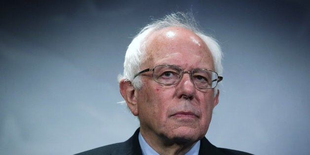 WASHINGTON, DC - SEPTEMBER 17: U.S. Sen. Bernie Sanders (I-VT) listens during a news conference about private prisons September 17, 2015 on Capitol Hill in Washington, DC. Sanders was joined by Rep. Keith Ellison (D-MN) to announce that they will introduce bills to ban private prisons. (Photo by Alex Wong/Getty Images)