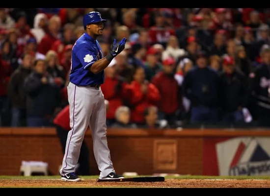 Adrian Beltre very sneakily tries to kick a slow roller foul