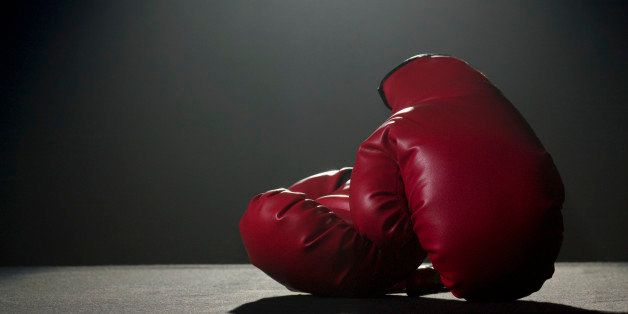 Boxing gloves in spotlight