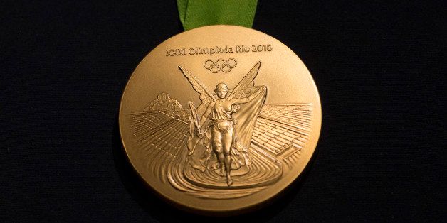 The Rio 2016 Olympic gold medal is presented during a ceremony at the Olympic Park in Rio de Janeiro, Brazil, Tuesday, June 14, 2016. Rio will host the Olympic games starting on Aug. 5, amid the worst recession to hit Brazil in decades, an outbreak of the Zika virus and the ongoing political crisis that saw President Dilma Rousseff impeached and suspended from office. (AP Photo/Felipe Dana)