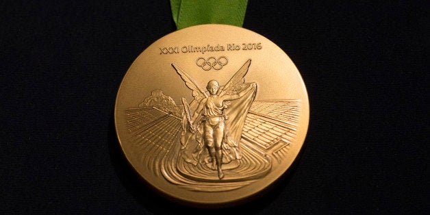 The Rio 2016 Olympic gold medal is presented during a ceremony at the Olympic Park in Rio de Janeiro, Brazil, Tuesday, June 14, 2016. Rio will host the Olympic games starting on Aug. 5, amid the worst recession to hit Brazil in decades, an outbreak of the Zika virus and the ongoing political crisis that saw President Dilma Rousseff impeached and suspended from office. (AP Photo/Felipe Dana)