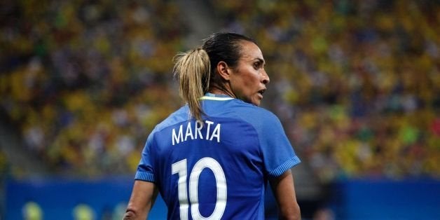 Brazil's player Marta is seen during the Olympic Games Rio 2016 women's first round Group E football match between South Africa and Brazil at the Arena Amazonia in Manaus, Brazil, on August 9, 2016. / AFP / RAPHAEL ALVES (Photo credit should read RAPHAEL ALVES/AFP/Getty Images)