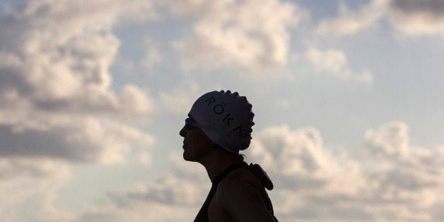 Ultra-marathoner Norma Bastidas looks to the horizon just before starting a record-setting triathlon as part of a campaign ag
