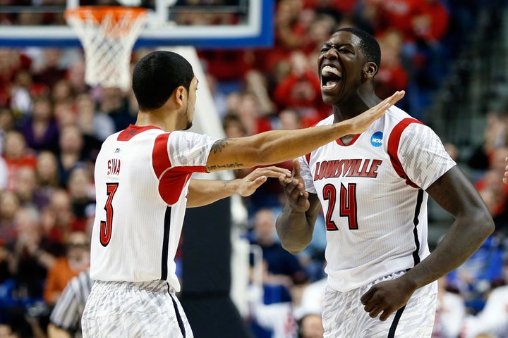 LEXINGTON, KY - MARCH 21: Montrezl Harrell #24 of the Louisville Cardinals celebrates with Peyton Siva #3 after a turnover a