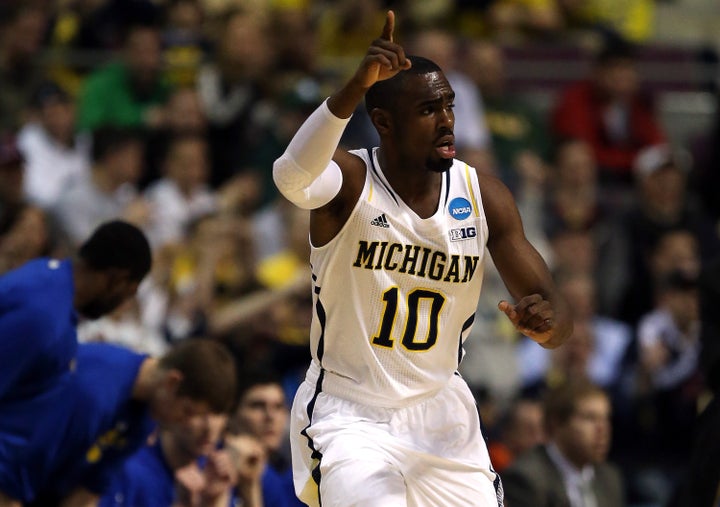 AUBURN HILLS, MI - MARCH 21: Tim Hardaway Jr. #10 of the Michigan Wolverines reacts in the first half against the South Dako