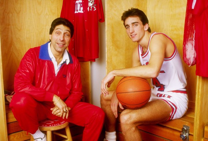 18 Jan 1988: Vinnie Del Negro of the North Carolina State Wolfpack poses with coach Jim Valvano at Reynolds Coliseum in Raleigh, North Carolina. Mandatory Credit: Allsport /Allsport