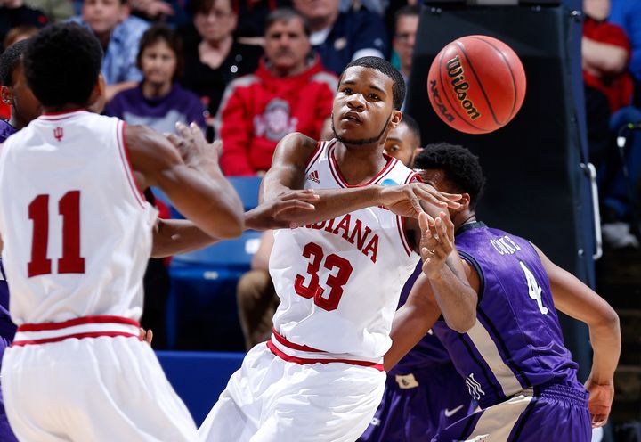 DAYTON, OH - MARCH 22: Yogi Ferrell #11 of the Indiana Hoosiers passes to Jeremy Hollowell #33 against the James Madison Dukes in the first half during the second round of the 2013 NCAA Men's Basketball Tournament at UD Arena on March 22, 2013 in Dayton, Ohio. (Photo by Joe Robbins/Getty Images)
