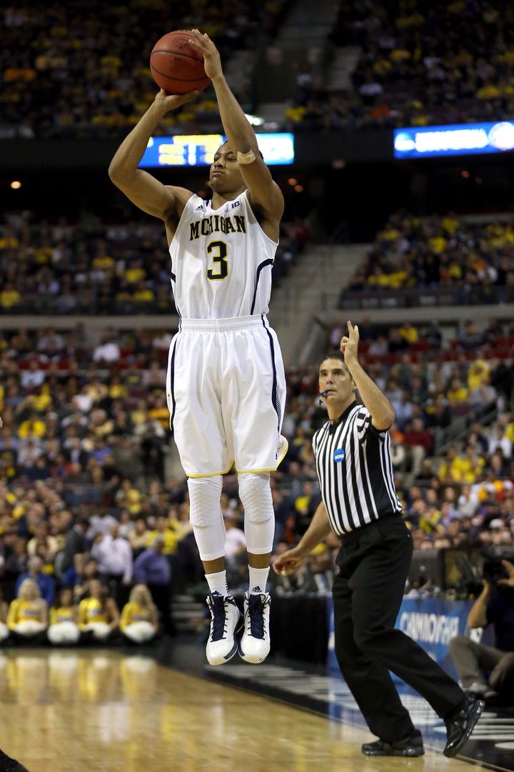 AUBURN HILLS, MI - MARCH 21: Trey Burke #3 of the Michigan Wolverines attempts a shot in the second half against the South Dakota State Jackrabbits during the second round of the 2013 NCAA Men's Basketball Tournament at at The Palace of Auburn Hills on March 21, 2013 in Auburn Hills, Michigan. (Photo by Jonathan Daniel/Getty Images)