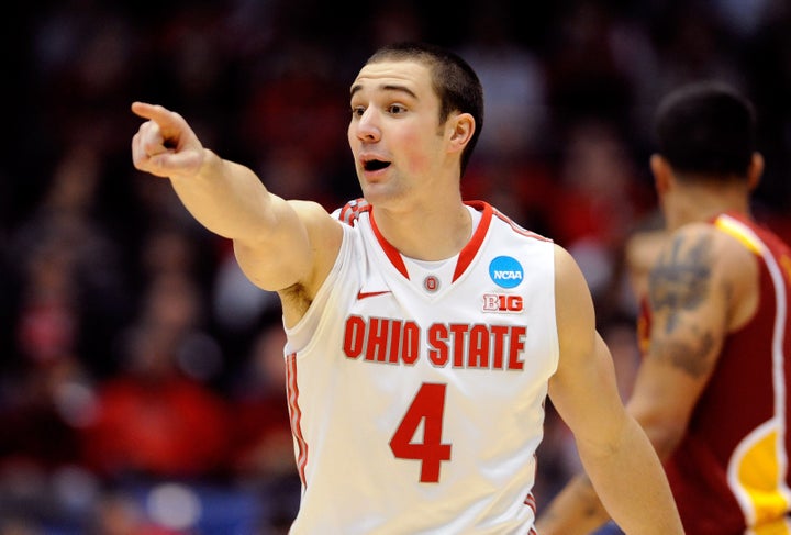 DAYTON, OH - MARCH 24: Aaron Craft #4 of the Ohio State Buckeyes gestures after a play against the Iowa State Cyclones in the