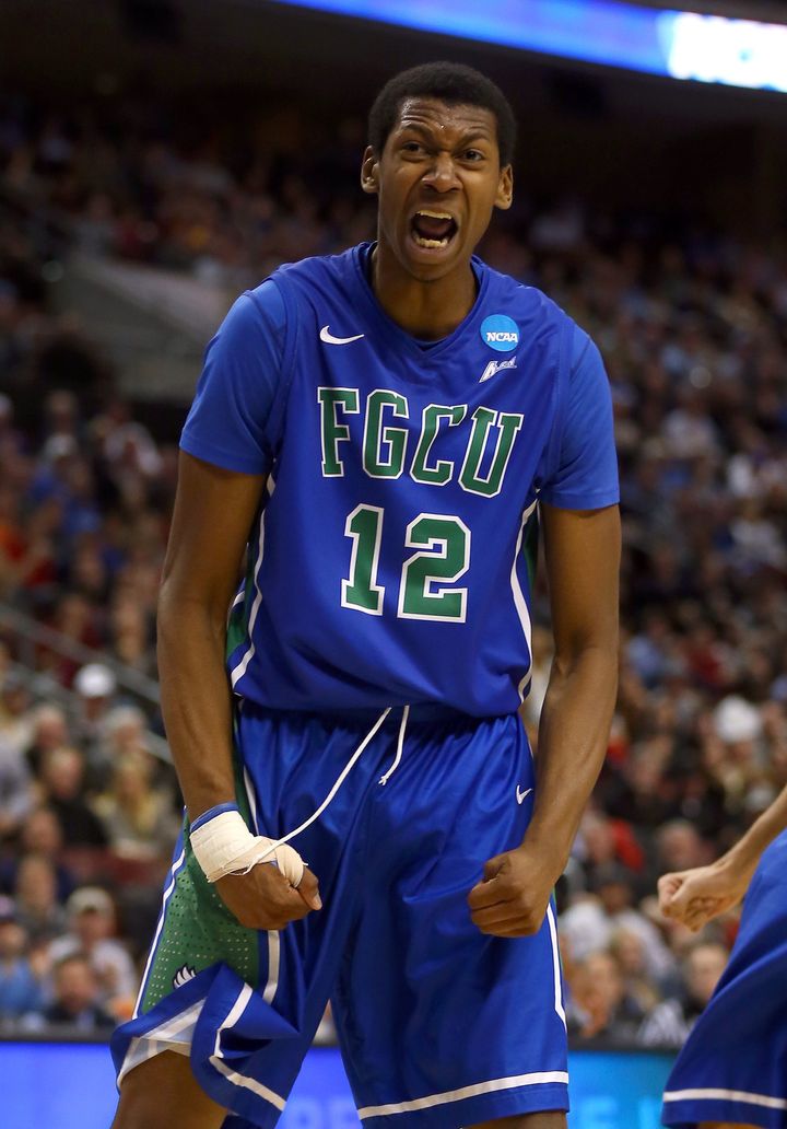 PHILADELPHIA, PA - MARCH 24: Eric McKnight #12 of the Florida Gulf Coast Eagles reacts after a blocked shot in the first half against the San Diego State Aztecs during the third round of the 2013 NCAA Men's Basketball Tournament at Wells Fargo Center on March 24, 2013 in Philadelphia, Pennsylvania. (Photo by Elsa/Getty Images)
