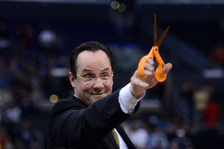 LOS ANGELES, CA - MARCH 30: Head coach Gregg Marshall of the Wichita State Shockers holds up a pair of scissors before cutting down the net after defeating the Ohio State Buckeyes 70-66 during the West Regional Final of the 2013 NCAA Men's Basketball Tournament at Staples Center on March 30, 2013 in Los Angeles, California. (Photo by Harry How/Getty Images)