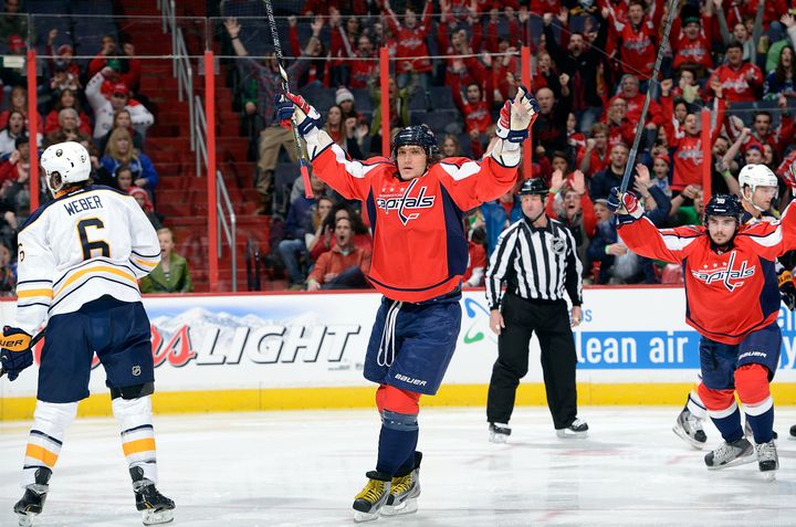 WASHINGTON, DC - MARCH 17: Alex Ovechkin #8 of the Washington Capitals celebrates after scoring in the first period against the Buffalo Sabres at the Verizon Center on March 17, 2013 in Washington, DC. (Photo by Greg Fiume/Getty Images)