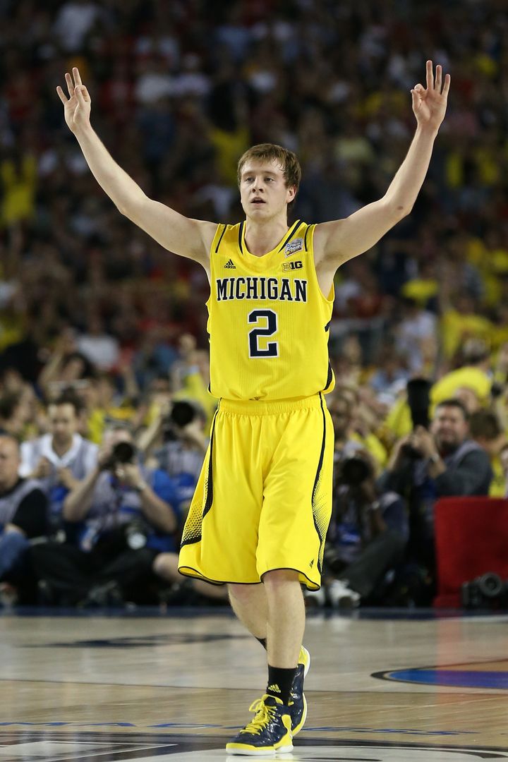 ATLANTA, GA - APRIL 08: Spike Albrecht #2 of the Michigan Wolverines reacts in the first half against the Louisville Cardinals during the 2013 NCAA Men's Final Four Championship at the Georgia Dome on April 8, 2013 in Atlanta, Georgia. (Photo by Streeter Lecka/Getty Images)