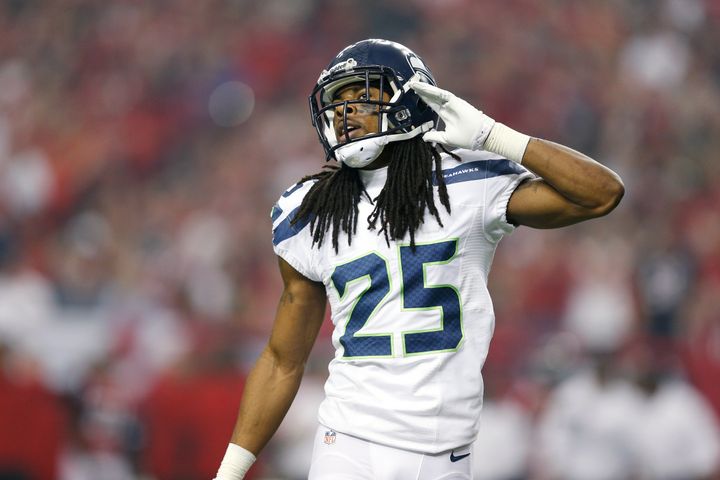 ATLANTA, GA - JANUARY 13: Richard Sherman #25 of the Seattle Seahawks gestures to the crowd against the Atlanta Falcons during the NFC Divisional Playoff Game at Georgia Dome on January 13, 2013 in Atlanta, Georgia. The Falcons defeated the Seahawks 30-28. (Photo by Joe Robbins/Getty Images)