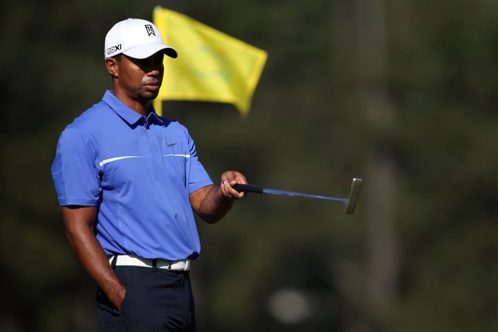 AUGUSTA, GA - APRIL 10: Tiger Woods of the United States walks across a green during a practice round prior to the start of the 2013 Masters Tournament at Augusta National Golf Club on April 10, 2013 in Augusta, Georgia. (Photo by Andrew Redington/Getty Images)