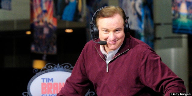 NEW ORLEANS - JANUARY 31: Former New Orleans Saints QB Archie Manning laughs as Tim Brando does a photo pose during his broad