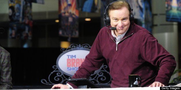 NEW ORLEANS - JANUARY 31: Former New Orleans Saints QB Archie Manning laughs as Tim Brando does a photo pose during his broadcast from Radio Row in New Orleans the site of SBXLVII on Thursday. (Photo by John Paul Filo/CBS via Getty Images) 