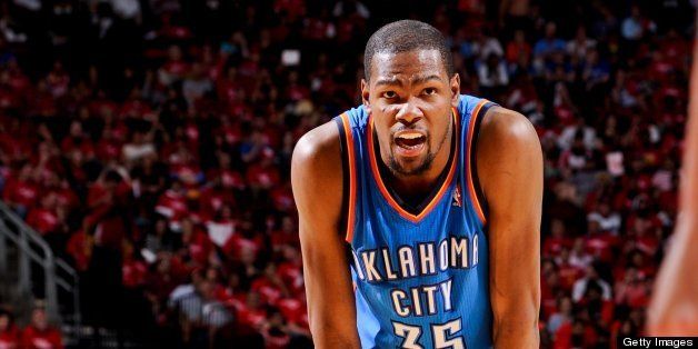 HOUSTON, TX - APRIL 29: Kevin Durant #35 of the Oklahoma City Thunder reacts while playing against the Houston Rockets in Game Four of the Western Conference Quarterfinals during the 2013 NBA Playoffs on April 29, 2013 at the Toyota Center in Houston, Texas. NOTE TO USER: User expressly acknowledges and agrees that, by downloading and or using this photograph, User is consenting to the terms and conditions of the Getty Images License Agreement. Mandatory Copyright Notice: Copyright 2013 NBAE (Photo by Bill Baptist/NBAE via Getty Images)